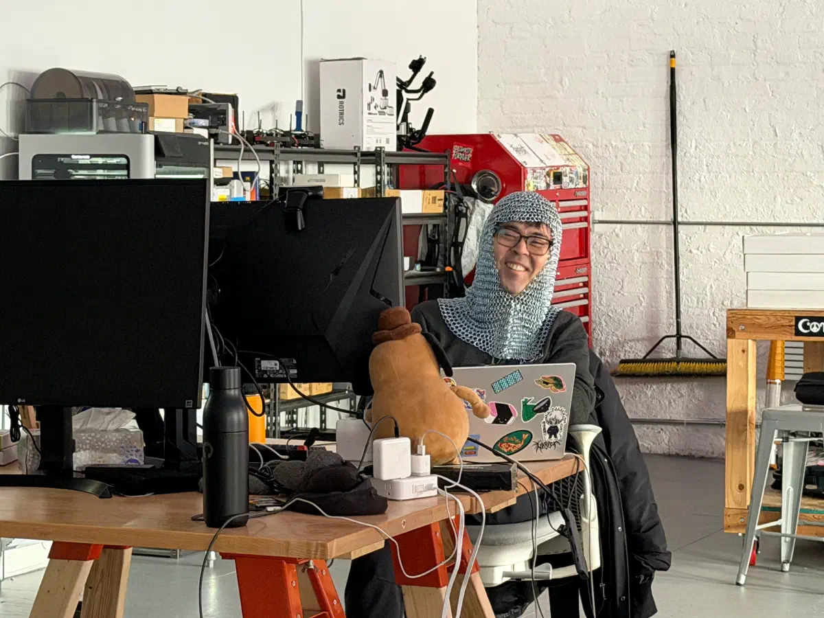 A person at a desk in the 2389 Research office.