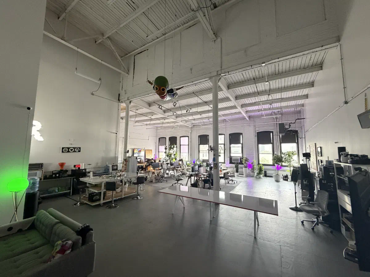 Worktables, windows, plants, and equipment in the 2389 Research office.